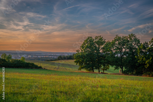 Pasture land and meadow before summer sunset near Doubravice village