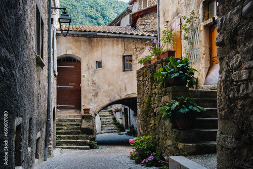 Fototapeta Naklejka Na Ścianę i Meble -  Street, staircase and old medieval houses in the small village of Chatillon en Diois in the south of France (Drome)