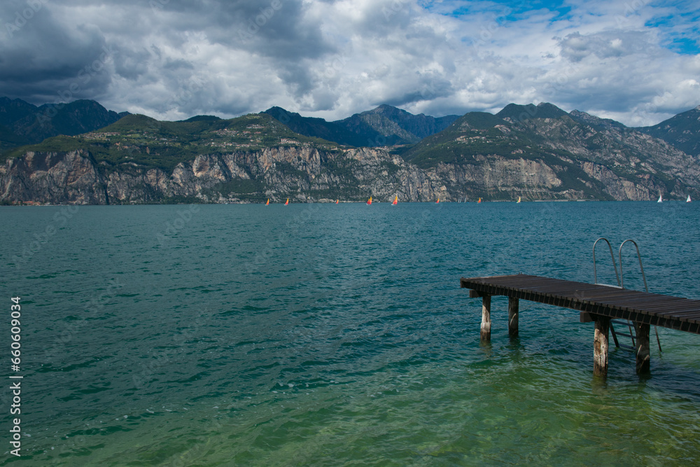 Summer cloudy day on Garda lake in Veneto, Italy