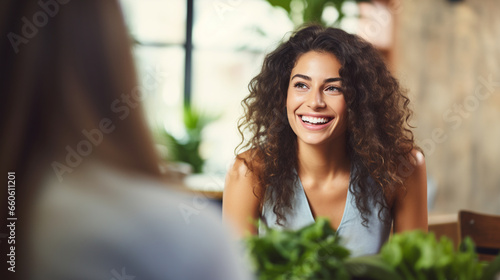 An optimistic healthy woman vegan leading a discussion on the benefits of plant-based nutrition, blurred background, with copy space