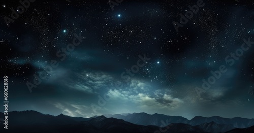 A night sky with a mountain range in the background