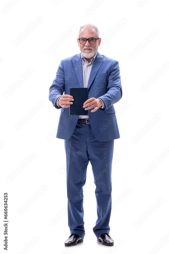 Old businessman holding book isolated on white Old businessman holding book isolated on white