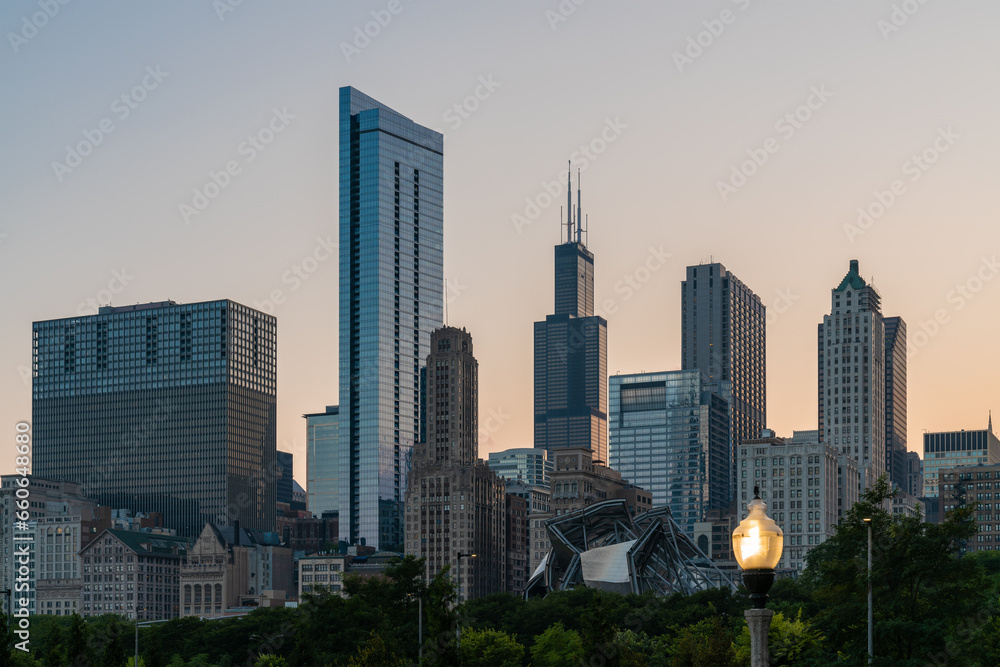 Chicago skyline panorama from Park at sunset. Chicago, Illinois, USA. Skyscrapers of financial district, a vibrant business neighborhood.