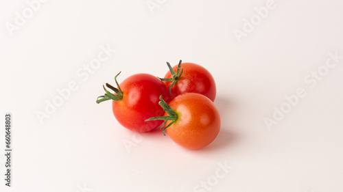 Tomato on a white background © Charles