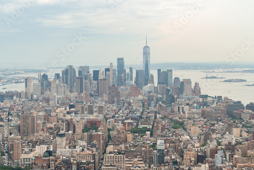 Aerial panoramic city view of Lower Manhattan   Midtown  Downtown  Financial district and West Side at day time  NYC  USA. New Jersey on horizon over the Hudson River. A vibrant business neighborhoods