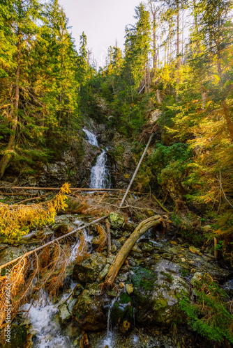 Koprova valley protected area of the national park in High Tatras, Slovakia , Liptov. Kmetov waterfall. photo