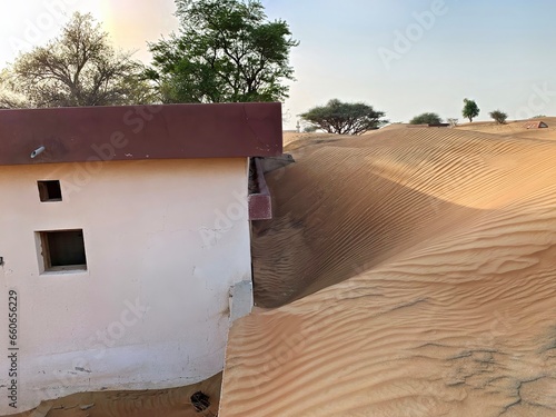 Al Madam. The desert takes back what belongs to it. Ghost town buried in sand