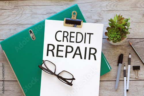 Wallpaper Mural Credit Repair text on white a4 paper. green folder Torontodigital.ca