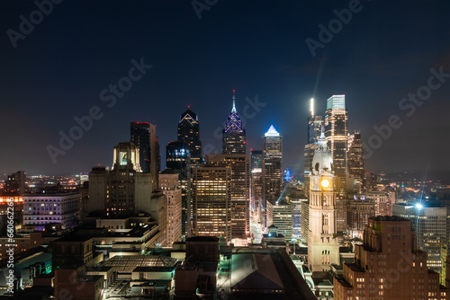 Aerial panoramic cityscape of Philadelphia financial downtown, Pennsylvania, USA. Philadelphia City Hall Clock Tower at summer night time. A vibrant business and cultural neighborhoods. photo