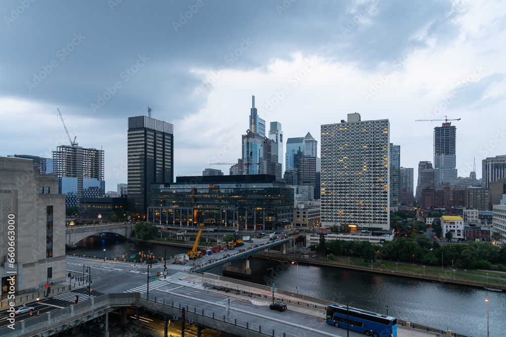 Aerial panoramic city view of Philadelphia financial downtown, Pennsylvania, USA. Chestnut Street Bridge and Market Bridge over Schuylkill River at summer day time. The economic and cultural center