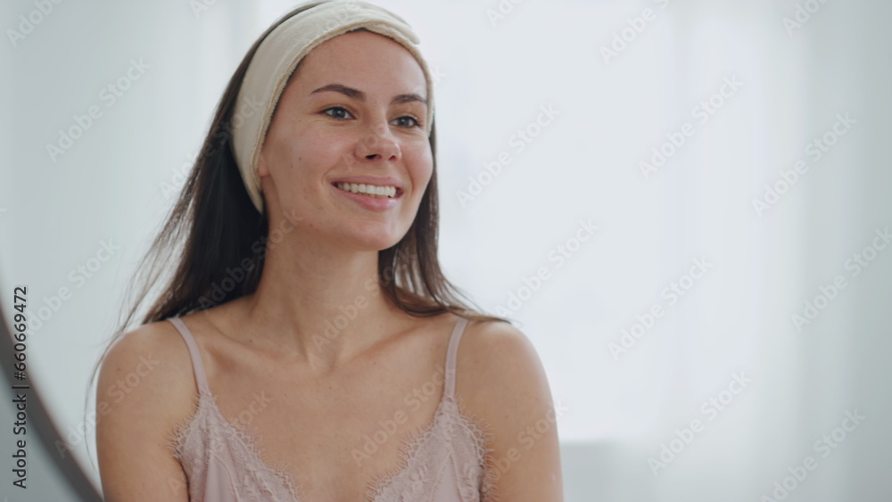 White teeth woman smiling in bathroom mirror. Closeup happy lady enjoying smile White teeth woman smiling in bathroom mirror. Closeup happy lady enjoying smile