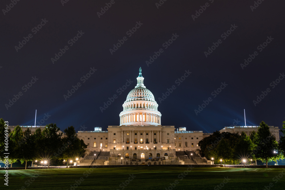 Neoclassical architecture of the Capitol dome building at night, Washington DC, USA. Illuminated Home of Congress and Capitol Hill. The concept of legislative branch, American political system