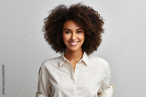 Happy young african american business woman with white shirt. Beauty black skin woman African Ethnic, female face. Smiling model isolated on white background. photo