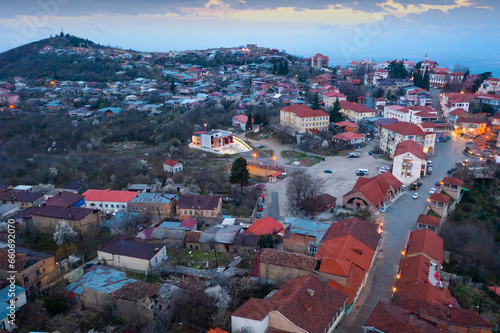 View from drone of houses at Sighnaghi town at spring evening, eastern Georgia