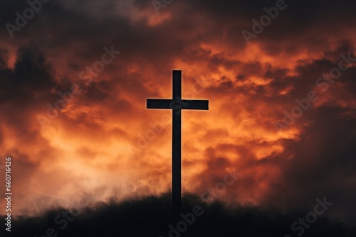 The cross stands out starkly against the fiery clouds, its dark silhouette a powerful symbol of the depth of Christs suffering.