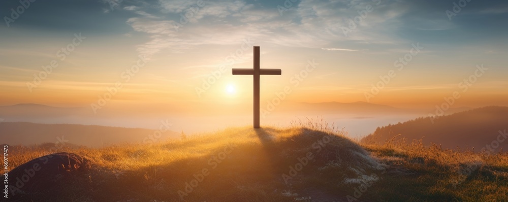 The soft, golden light of the sunrise casting a warm glow on the cross, giving it a serene and sacred aura.