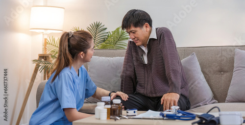 Caregivers assist elderly man with check-ups and physical therapy while he is recover at home.