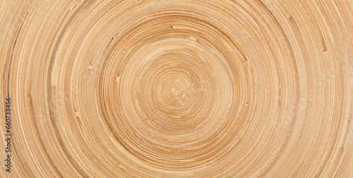The abstract circular wooden bamboo texture background. © zhikun sun