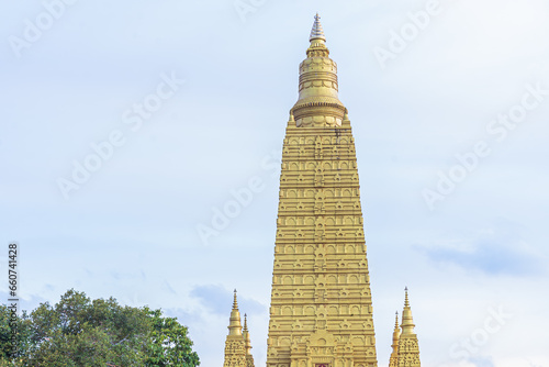 Wat Mahathat Wachiramongkol (Wat Bang Tong) at Na Nuea, Ao Luek District, Krabi, Thailand. Aerial view of buddhist temple. Amazing big beautiful temple in Thailand Timelapses photo