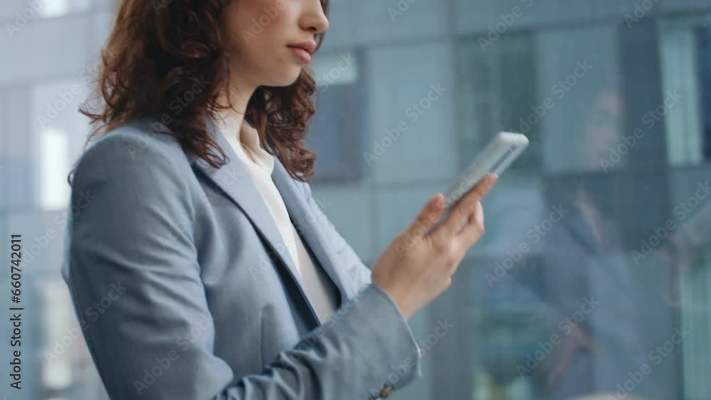Company worker answering call at office window close up. Girl talking telephone Company worker answering call at office window close up. Girl talking telephone