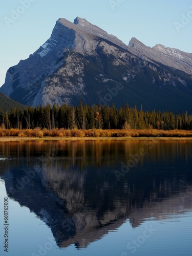 Natural reflection with Mount Rundle in the background at Banff National Park