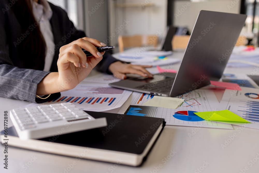 Businessman working at office with documents on his desk, doing planning analyzing the financial report, business plan investment, finance analysis concept Businessman working at office with documents on his desk, doing planning analyzing the financial report, business plan investment, finance analysis concept