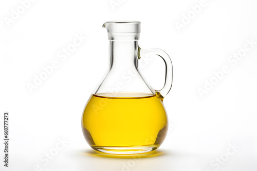 Olive oil in a glass decanter on a white background