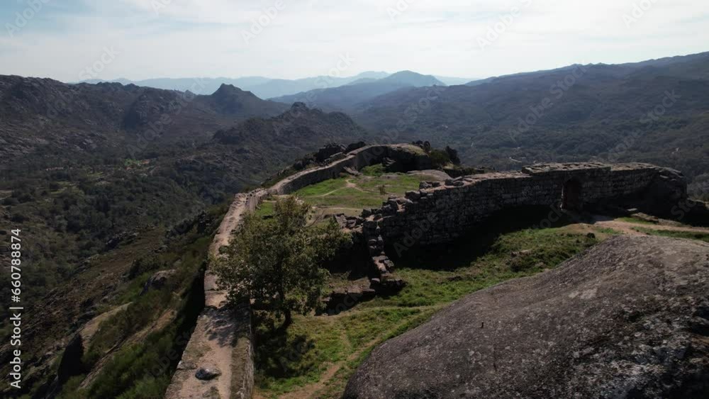 Aerial view of the ruins of the Castro Laboreiro castle at the Peneda Geres National Park in Portugal Aerial view of the ruins of the Castro Laboreiro castle at the Peneda Geres National Park in Portugal