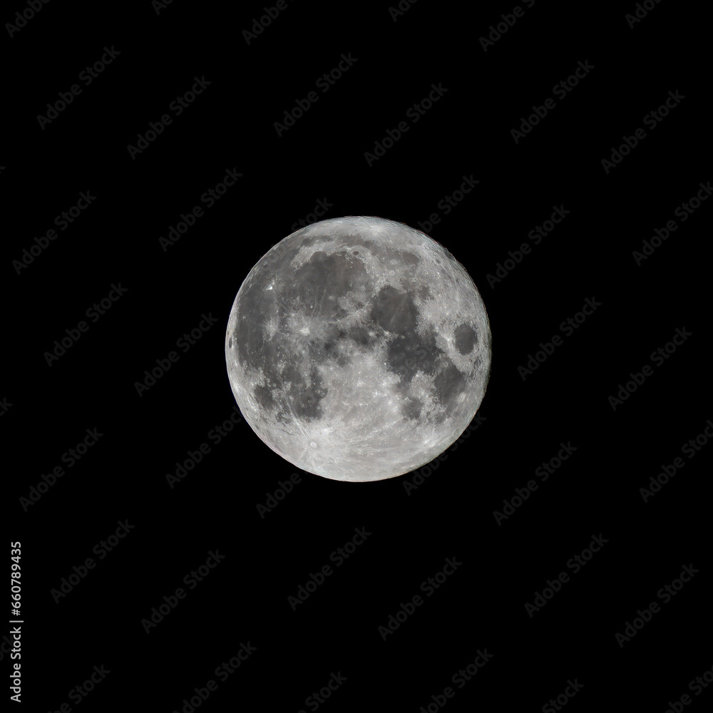 Fototapeta premium Super fool moon on black background, detailed image