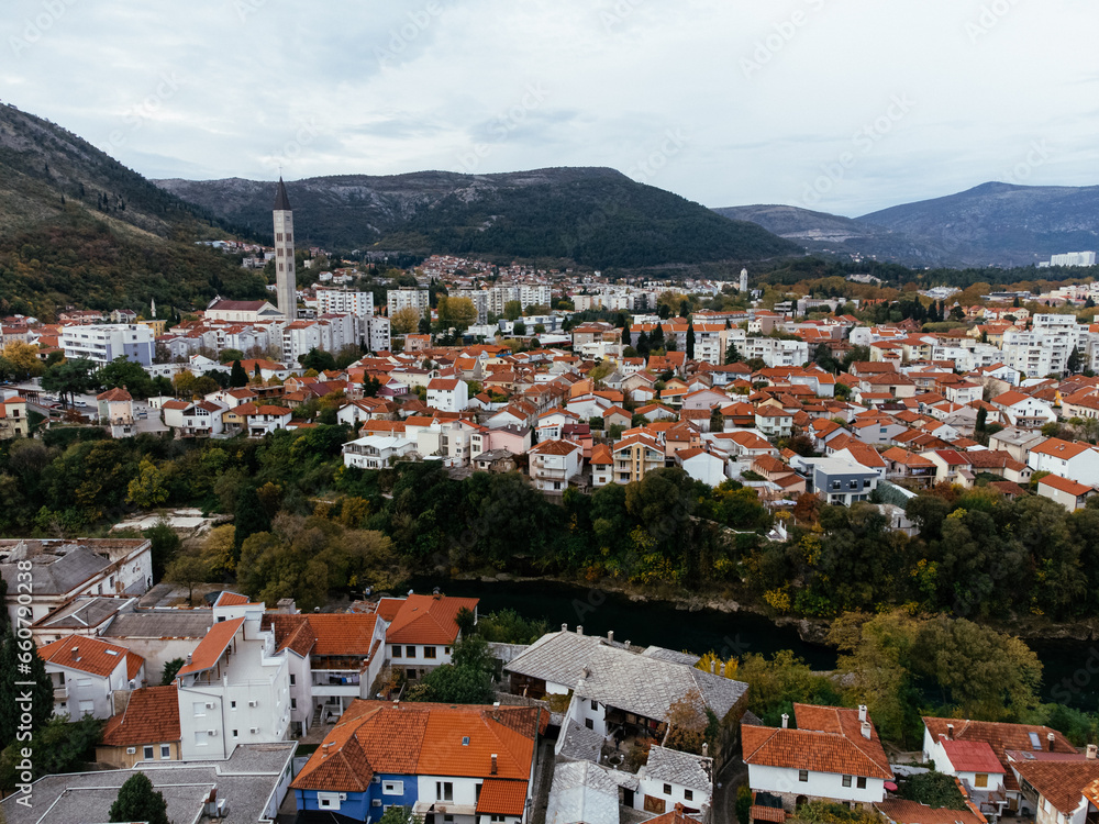 Aerial view of the city of Mostar and Neretva river, old Bridge, Koski Mehmed Pasha Mosque. Bosnia and Herzegovina