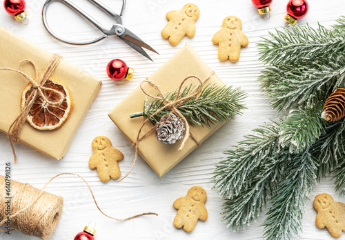 Fototapeta Naklejka Na Ścianę i Meble -  Christmas gifts, gingerbread cookies, decorations with christmas tree.