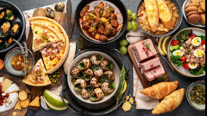 Traditional french food -mussel and meat dishes, ratatouille, snails, croissants, desserts, fresh pastries and cheese.