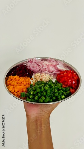 Healthy and fresh vegetables in a plate, beans, carrot, tomato, beetroot, diet food
