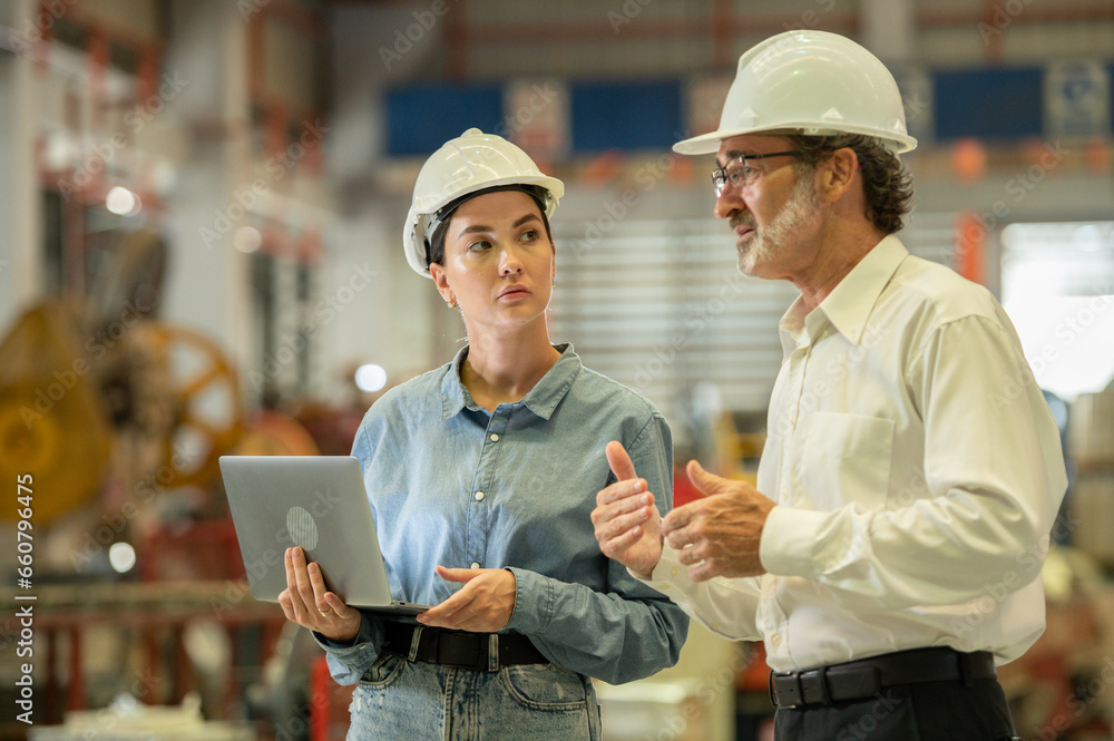 woman engineer assistant secretary in helmet inspection check control heavy machine construction installation in industrial factory with boss manager. Boss and partnership check maintenance factory woman engineer assistant secretary in helmet inspection check control heavy machine construction installation in industrial factory with boss manager. Boss and partnership check maintenance factory