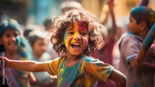 Happy children enjoy colored Holy fest. © MiguelAngel