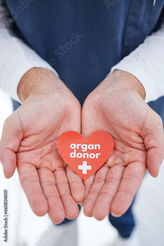 Nurse, hands and heart for organ donor, transplant and good deed for healthcare, medical service and work. Doctor, hospital and charity for help, support and sign for medicare, compassion and donatio photo