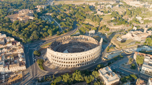 Rome, Italy. Roman Coliseum. Flight over the city. Panorama of the city in the morning. Summer, Aerial View