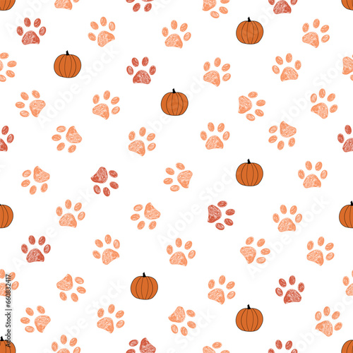 Pumpkins orange colored paw prints seamless pattern