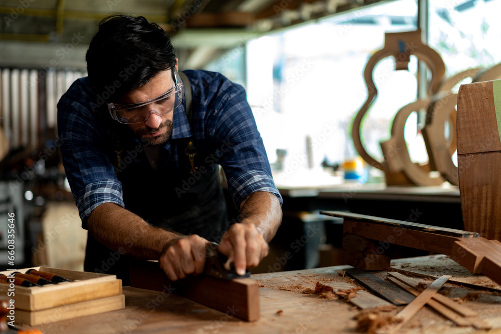 Guitar Making Process: Luthier Uses Planer on Neck Guitar Making Process: Luthier Uses Planer on Neck