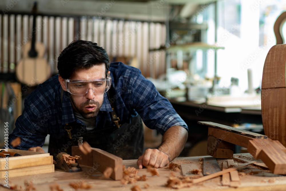 Guitar Making Process: Luthier Uses Planer on Neck Guitar Making Process: Luthier Uses Planer on Neck