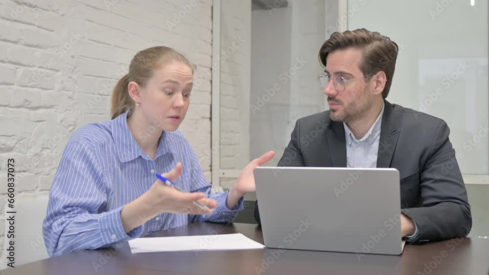 Angry Businesswoman Talking with Businessman in Office Angry Businesswoman Talking with Businessman in Office