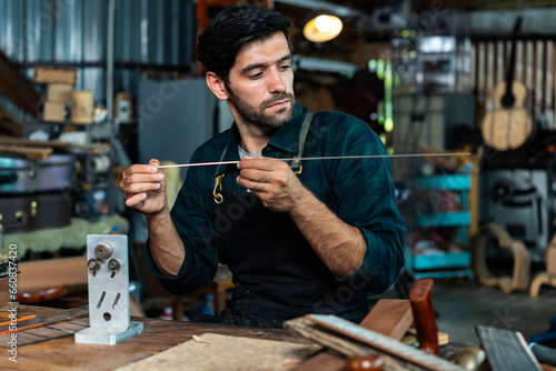 Guitar Luthier Bends Fretwire photo