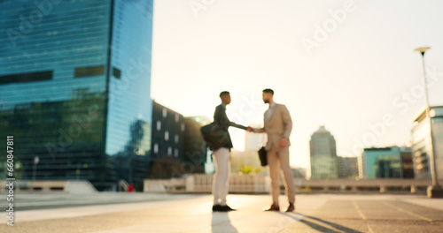 Networking, walking or business people shaking hands in city for project agreement or b2b deal. Teamwork, outdoor handshake or men meeting for a negotiation, offer or partnership opportunity together