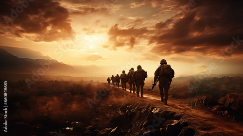 Silhouette of a group of soldiers at sunset