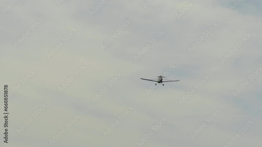 A propeller plane flying in the sky after towing a glider. A propeller plane flying in the sky after towing a glider.