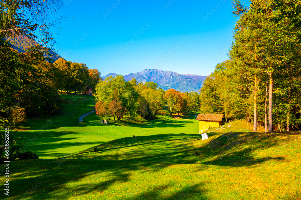 Hole 4 in Golf Course Menaggio with Mountain View in Autumn in Lombardy, Italy.