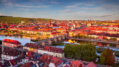 Obraz na płótnie Wurzburg, Germany. Aerial cityscape image of Wurzburg with Old Main Bridge over Main river during beautiful autumn sunset. w salonie