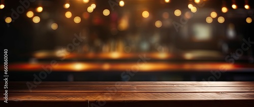 Empty wooden table. Cozy corner. Background bokeh in vintage cafe. Blurred ambiance. Coffee shop dreams. Infused interior