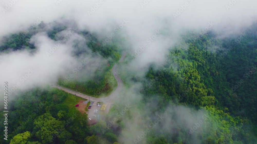 Aerial view of Floating road in morning with fog, The transportation road across mountain. Nan, Thailand. Aerial view of Floating road in morning with fog, The transportation road across mountain. Nan, Thailand.