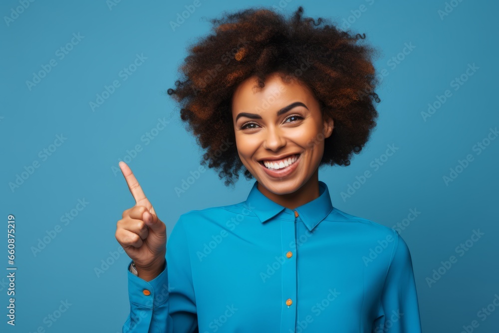 happy woman showing index finger on blue background. generative ai. happy woman showing index finger on blue background. generative ai.